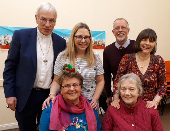 Back row: Rt Rev Colin Sinclair, development worker Louisa Turner, Rev Robin McAlpine and Ruth Sinclair. Front row: Margaret and Angela, two volunteers who run the after school club