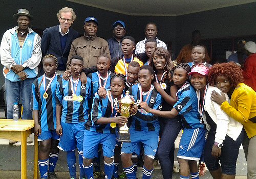 Jane Racheal and some of the team / coaches after their win in Lusaka