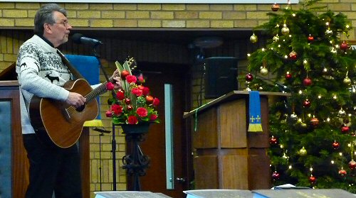Bruce Davies sings at Christmas